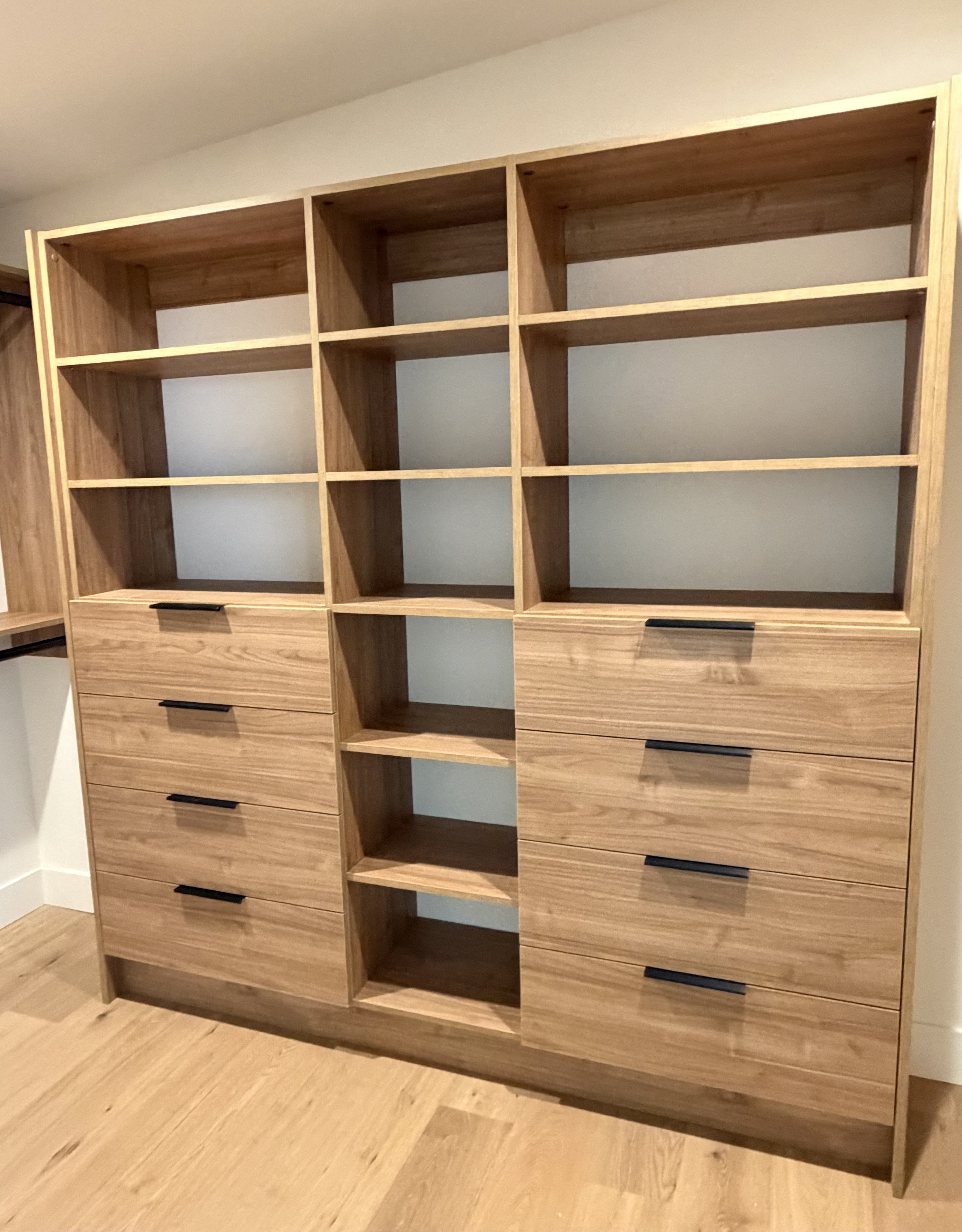 Custom wood closet organizer with drawers