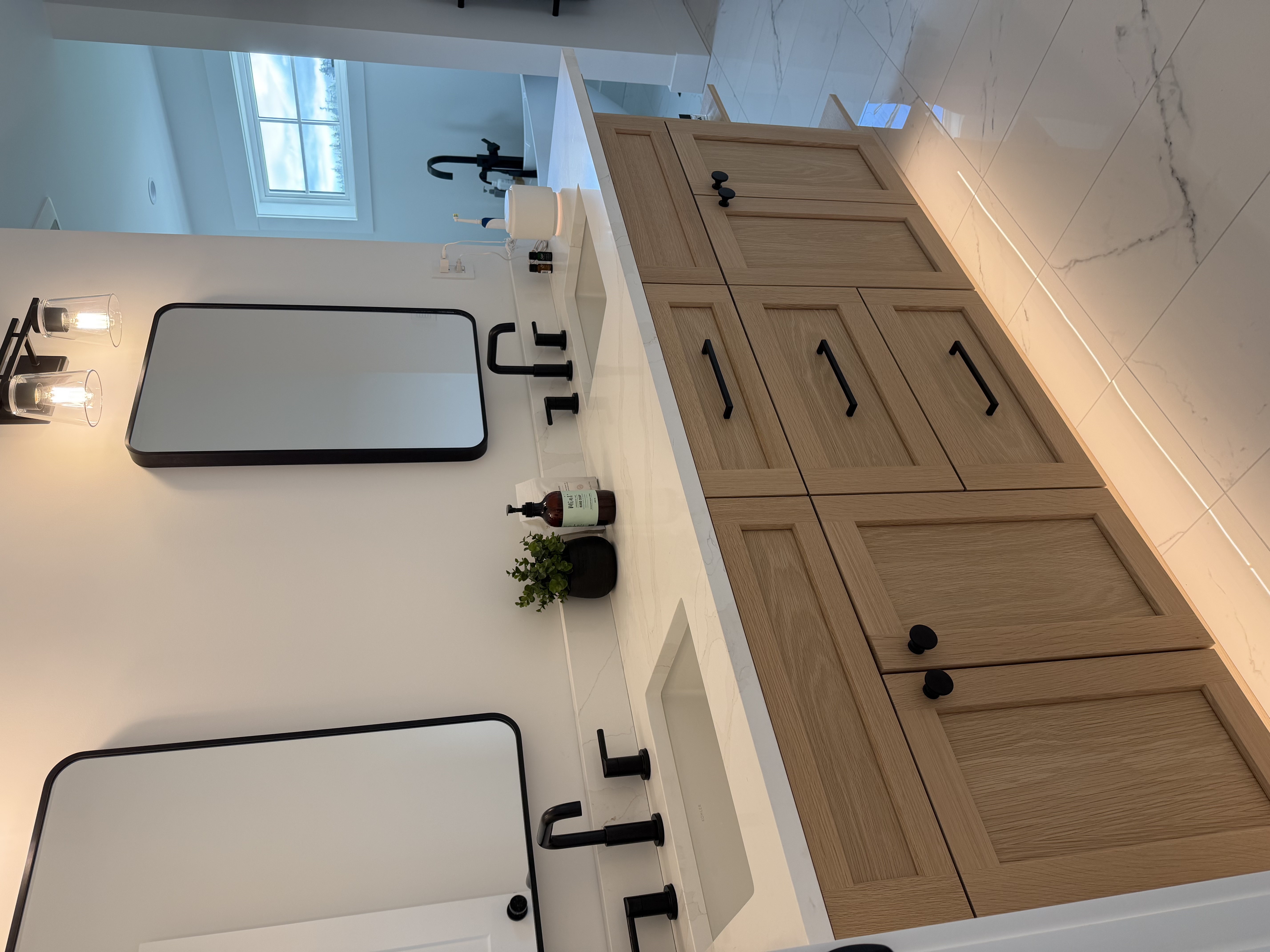 Bathroom vanity with oak cabinetry